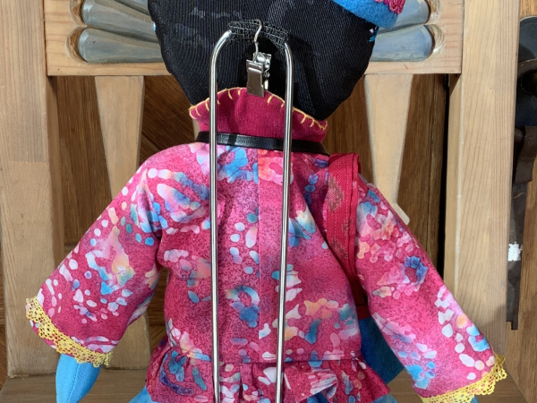 Ruby the Rainbow Owl Plays Tourist at the Rail Yard Market by KD Rivera