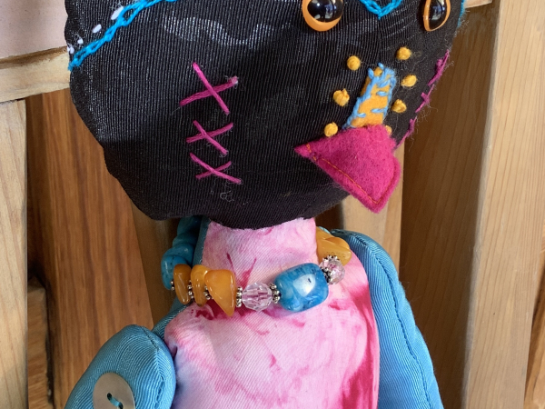 Ruby the Rainbow Owl Plays Tourist at the Rail Yard Market by KD Rivera
