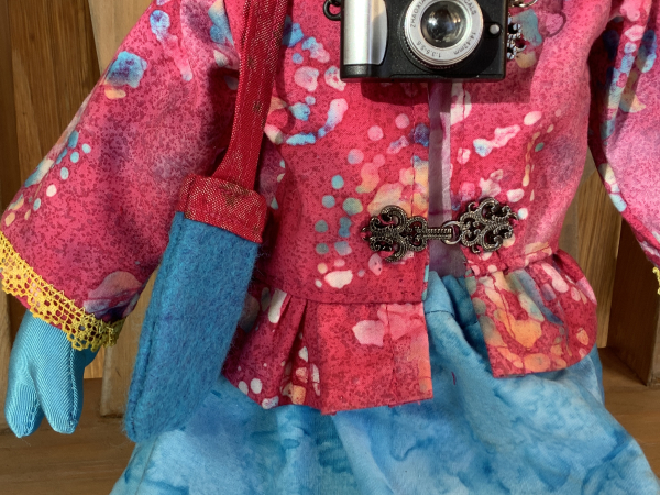 Ruby the Rainbow Owl Plays Tourist at the Rail Yard Market by KD Rivera