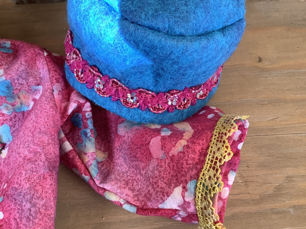 Ruby the Rainbow Owl Plays Tourist at the Rail Yard Market by KD Rivera
