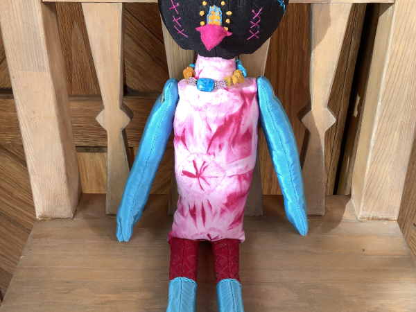 Ruby the Rainbow Owl Plays Tourist at the Rail Yard Market by KD Rivera