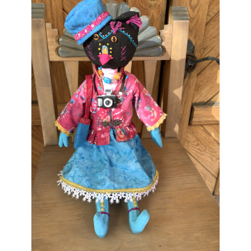 Ruby the Rainbow Owl Plays Tourist at the Rail Yard Market by KD Rivera